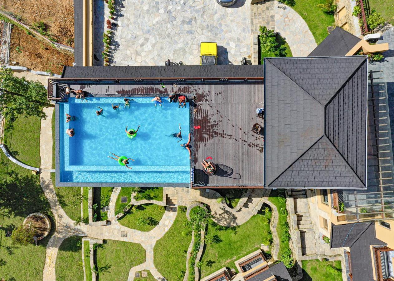 Bar Peepal Resort 포카라 외부 사진 Aerial view of the pool